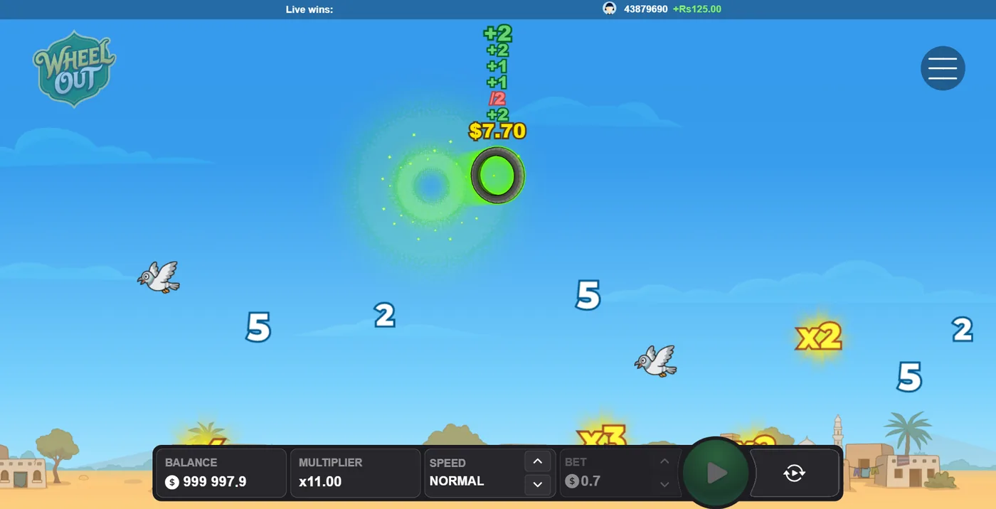 Wheel Out mid-flight: a tire collecting bonuses and multipliers over a desert village